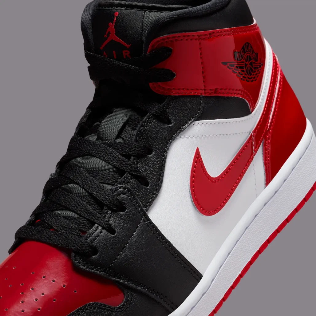 air-jordan-1-mid-black-varsity